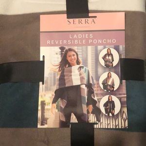 Brand NEW Reversible poncho never used